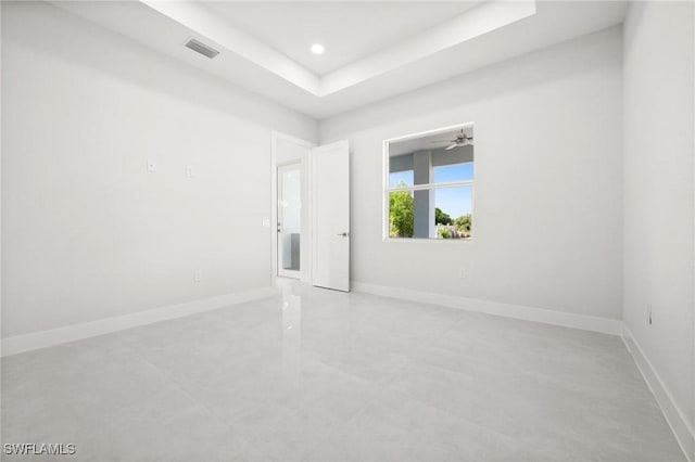 3631 68th Ave NE, Naples, FL 34120 - unfurnished room with visible vents, recessed lighting, a ceiling fan, a raised ceiling, and baseboards