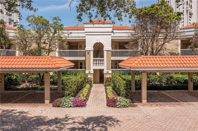 view of property with covered parking