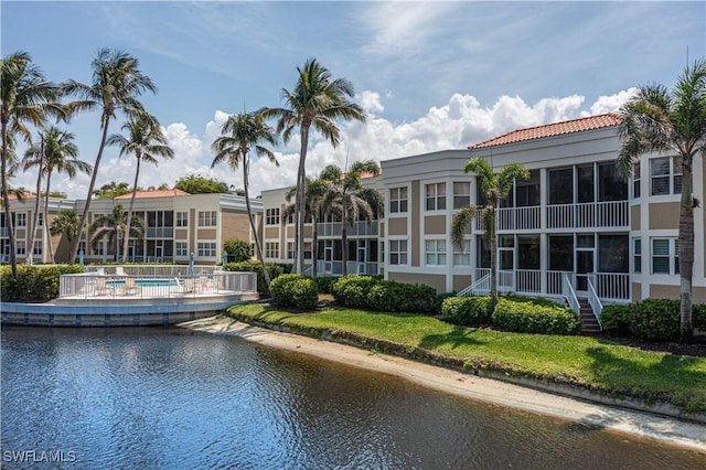 view of building exterior featuring a water view