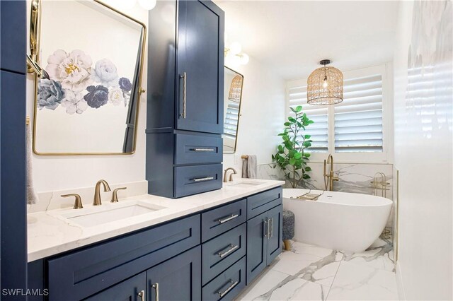 bathroom with marble look tile flooring, a freestanding tub, and double vanity