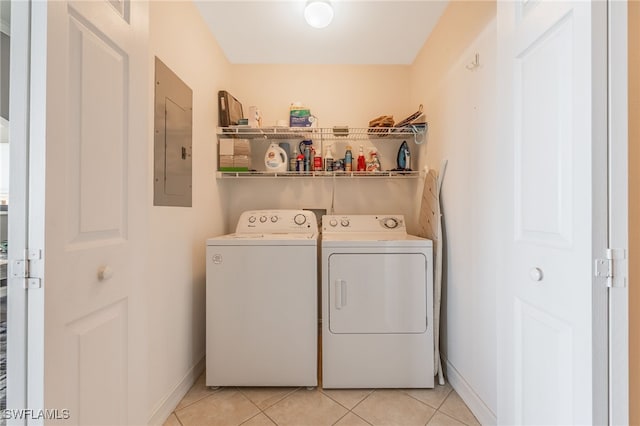 20930 Island Sound Cir Unit 402, Estero, FL 33928 - washroom with washing machine and dryer, electric panel, and light tile patterned floors