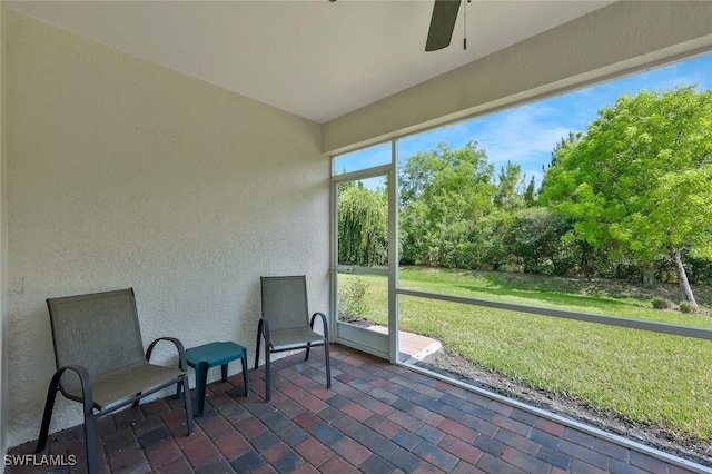2036 Pigeon Plum Way N, Fort Myers, FL 33917 - unfurnished sunroom with a ceiling fan