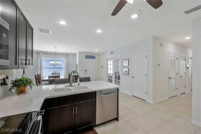 2036 Pigeon Plum Way N, Fort Myers, FL 33917 - kitchen with a sink, a peninsula, ceiling fan with notable chandelier, visible vents, and dishwasher