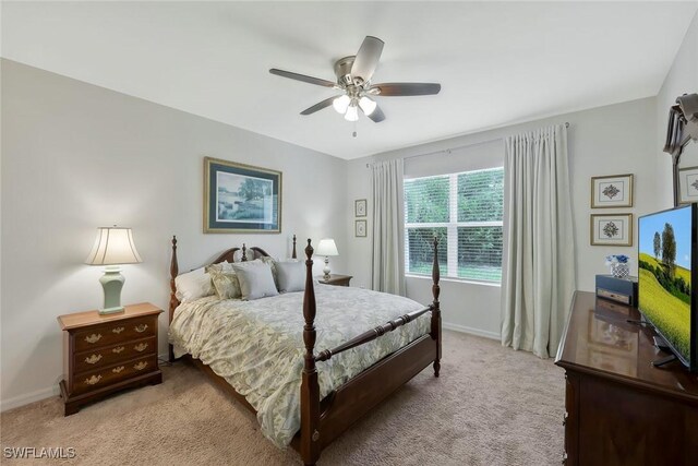 2036 Pigeon Plum Way N, Fort Myers, FL 33917 - bedroom with light colored carpet, baseboards, and a ceiling fan