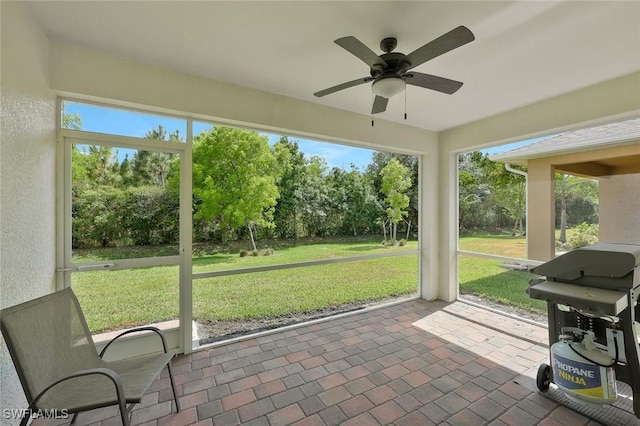 2036 Pigeon Plum Way N, Fort Myers, FL 33917 - sunroom / solarium featuring a wealth of natural light and a ceiling fan