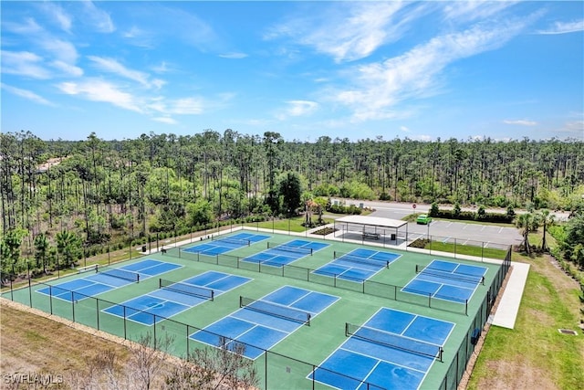 2036 Pigeon Plum Way N, Fort Myers, FL 33917 - bird's eye view featuring a wooded view