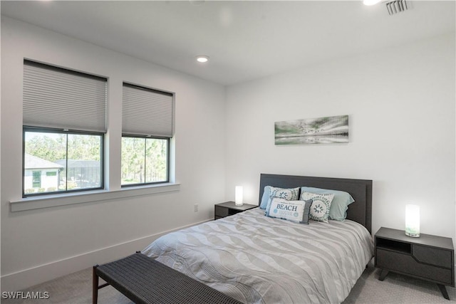 bedroom featuring carpet, visible vents, baseboards, and recessed lighting
