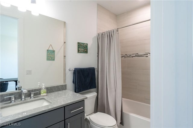 full bathroom with toilet, shower / tub combo with curtain, and vanity