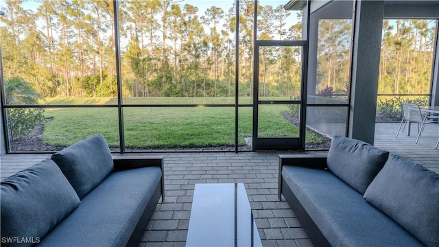 sunroom / solarium featuring an outdoor living space