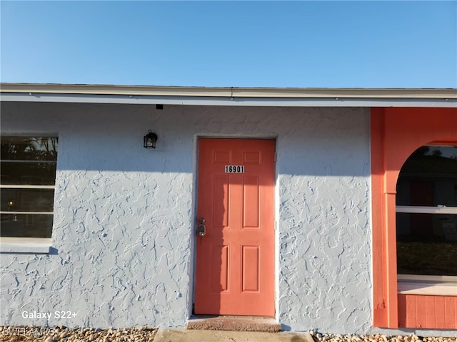 16901 Juanita Ave, Fort Myers, FL 33908 - entrance to property featuring stucco siding