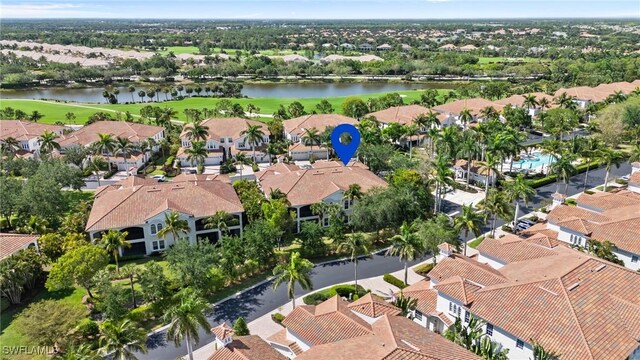 9083 Cascada Way Unit 101, Naples, FL 34114 - aerial view of residential area with a large body of water and a local golf course