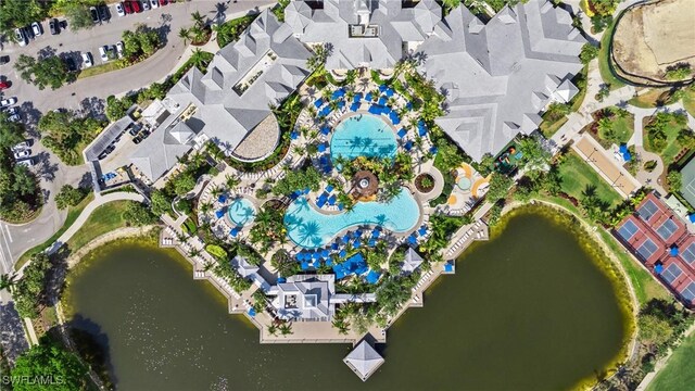 9083 Cascada Way Unit 101, Naples, FL 34114 - drone / aerial view of a pool and a nearby body of water