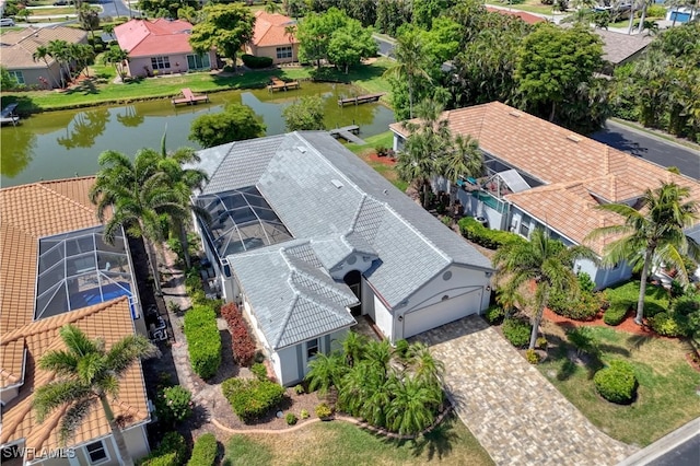 bird's eye view with a water view and a residential view
