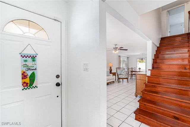 5816 Whiting Ct, Fort Myers, FL 33919 - entryway with stairway, light tile patterned floors, and ceiling fan