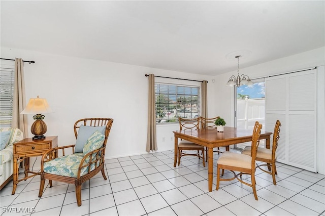 5816 Whiting Ct, Fort Myers, FL 33919 - dining area with a chandelier and light tile patterned floors