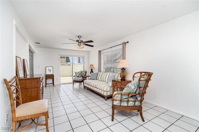 5816 Whiting Ct, Fort Myers, FL 33919 - living room with ceiling fan, baseboards, and light tile patterned floors