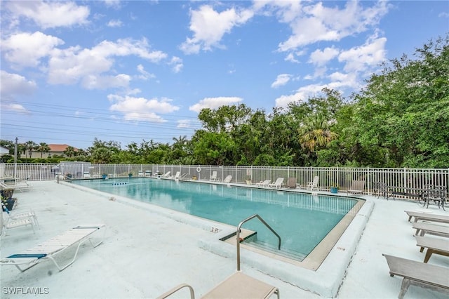 5816 Whiting Ct, Fort Myers, FL 33919 - community pool with fence and a patio