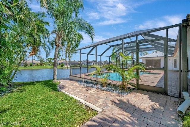 6953 Wittman Dr, Fort Myers, FL 33919 - view of patio featuring an outdoor pool, a lanai, and a water view