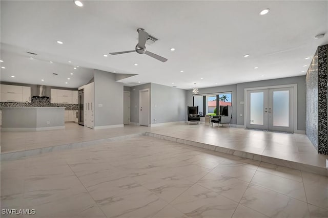 6953 Wittman Dr, Fort Myers, FL 33919 - unfurnished living room with french doors, recessed lighting, a ceiling fan, baseboards, and light marble finish flooring