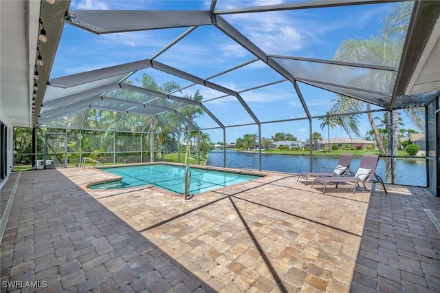 6953 Wittman Dr, Fort Myers, FL 33919 - outdoor pool with a patio area, a water view, and a lanai