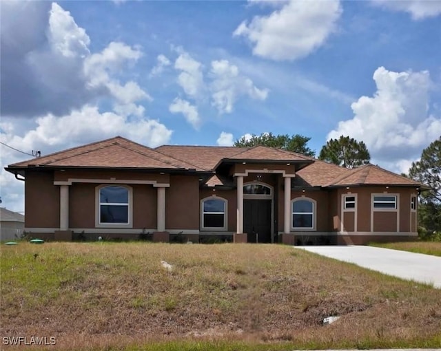 3707 13th St W, Lehigh Acres, FL 33971 - view of front of property with stucco siding