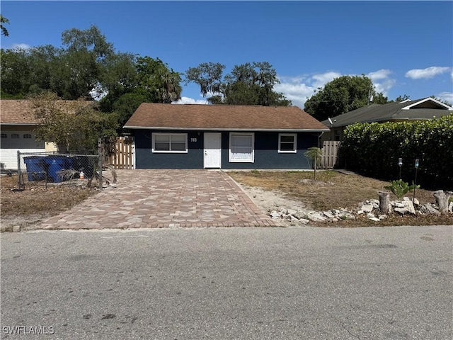 27831 Quinn St, Bonita Springs, FL 34135 - ranch-style house with stucco siding and fence