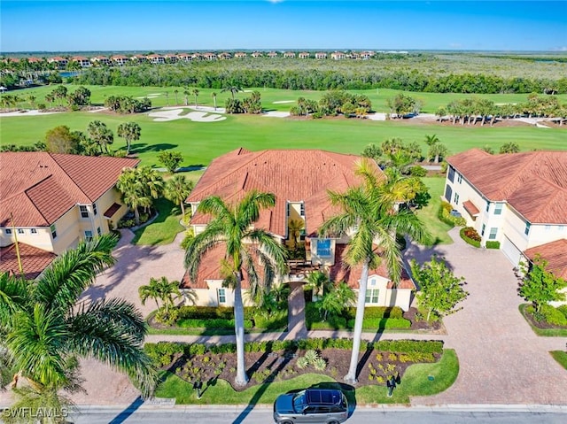birds eye view of property featuring golf course view