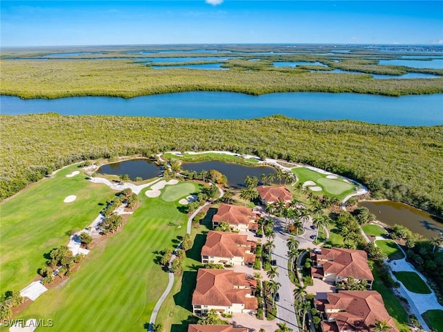 aerial view featuring view of golf course, a water view, and a residential view