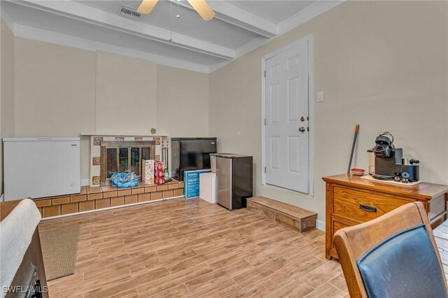 1331 Rio Vista Ave, Fort Myers, FL 33901 - living area featuring a ceiling fan, beam ceiling, and light wood-type flooring