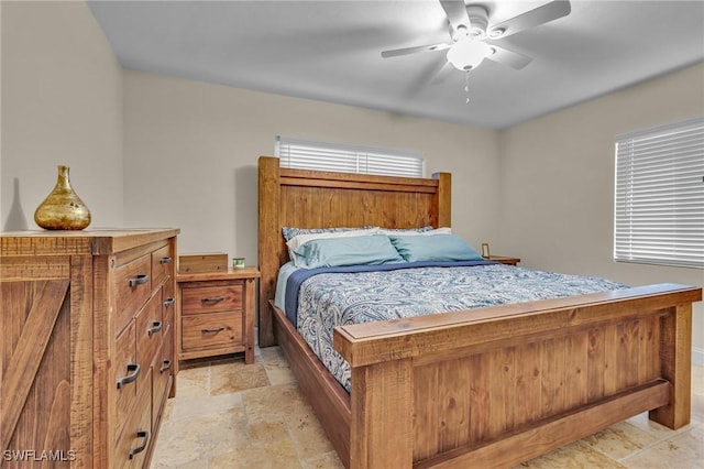1331 Rio Vista Ave, Fort Myers, FL 33901 - bedroom featuring stone tile flooring and a ceiling fan