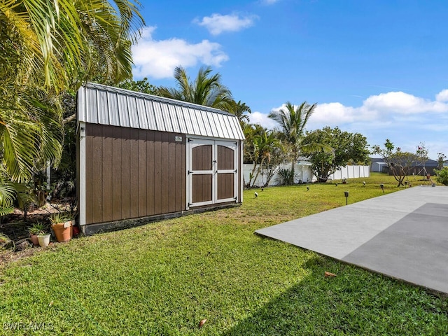 621 NW 28th Ter, Cape Coral, FL 33993 - view of yard with a storage shed, an outdoor structure, and a patio area