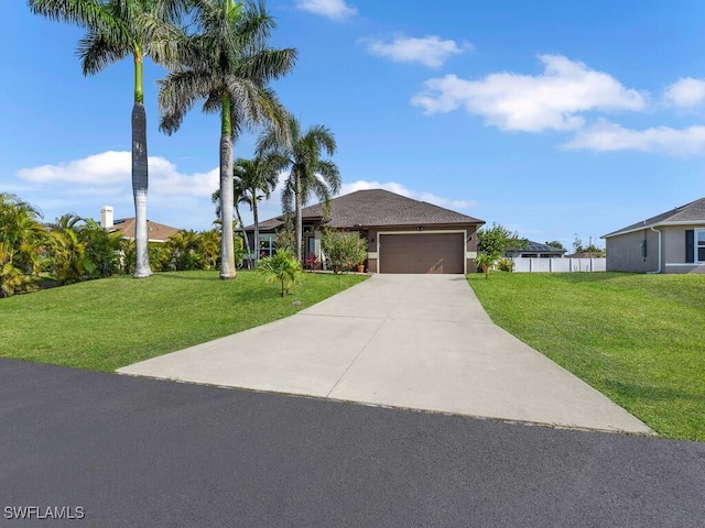621 NW 28th Ter, Cape Coral, FL 33993 - ranch-style house featuring an attached garage and concrete driveway