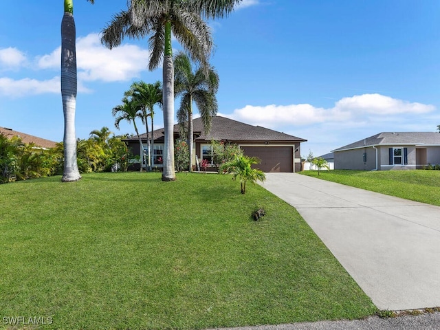 621 NW 28th Ter, Cape Coral, FL 33993 - single story home featuring concrete driveway, a garage, and a front lawn