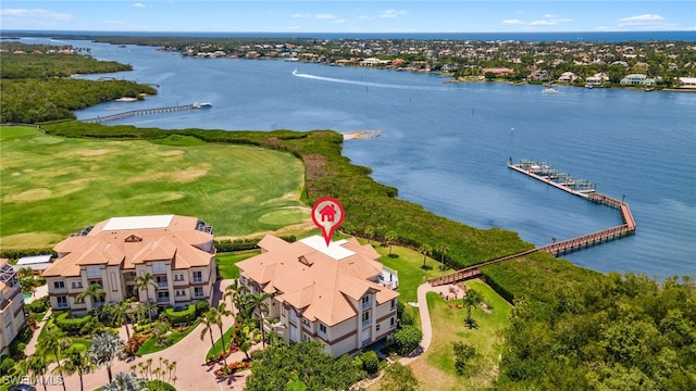 1520 Star Point Ln Unit 4-401, Naples, FL 34112 - drone / aerial view of a nearby body of water and a local golf course