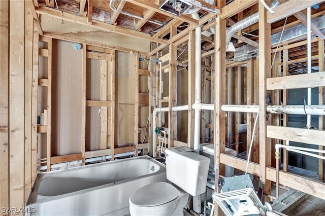 4722 SE 1st Pl Unit 12, Cape Coral, FL 33904 - full bathroom with a tub to relax in and toilet