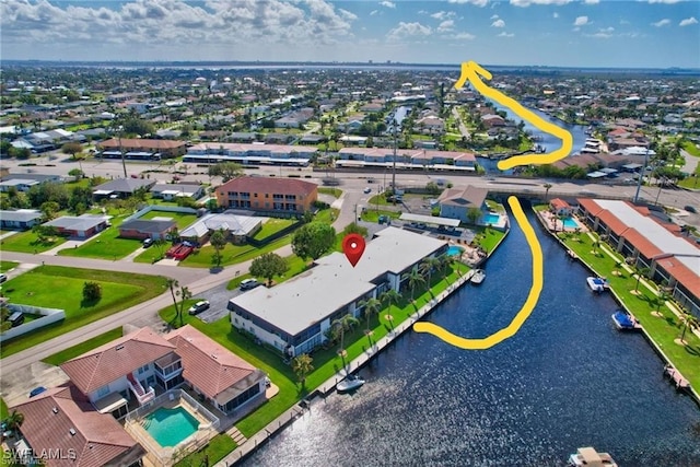 4722 SE 1st Pl Unit 12, Cape Coral, FL 33904 - birds eye view of property featuring a water view and a residential view