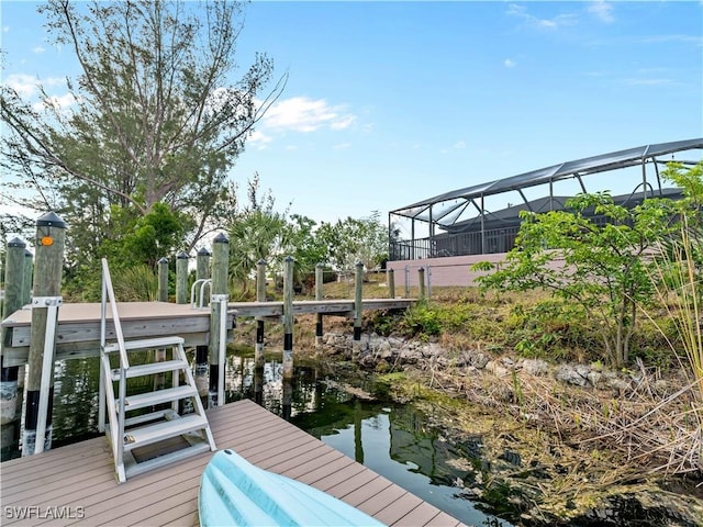 507 NE 31st St, Cape Coral, FL 33909 - view of dock featuring a lanai