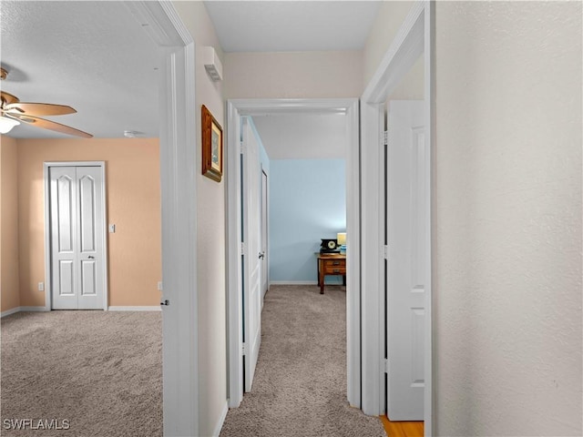 507 NE 31st St, Cape Coral, FL 33909 - hall featuring light carpet and baseboards