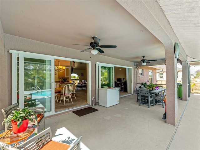 507 NE 31st St, Cape Coral, FL 33909 - view of patio featuring a ceiling fan and outdoor dining space