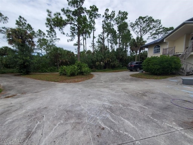 880 18th St NE, Naples, FL 34120 - view of yard