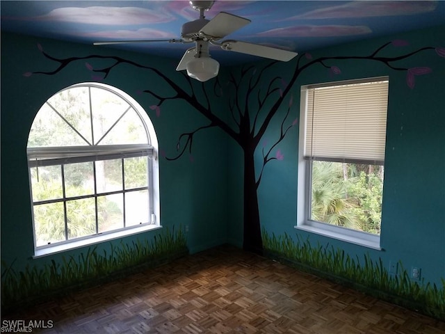 880 18th St NE, Naples, FL 34120 - unfurnished room featuring wallpapered walls, baseboards, and a ceiling fan