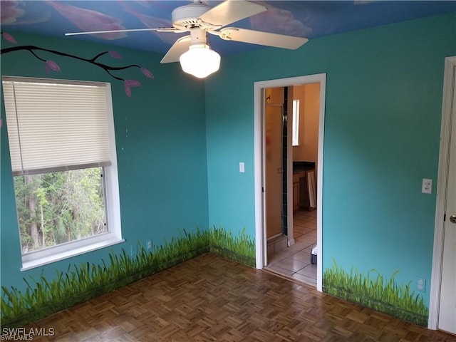 880 18th St NE, Naples, FL 34120 - unfurnished room with a ceiling fan