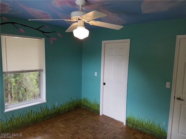 880 18th St NE, Naples, FL 34120 - empty room with a ceiling fan