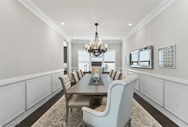 4605 Azalea Dr, Naples, FL 34119 - dining area with a chandelier, a wainscoted wall, dark wood-style flooring, a decorative wall, and ornamental molding