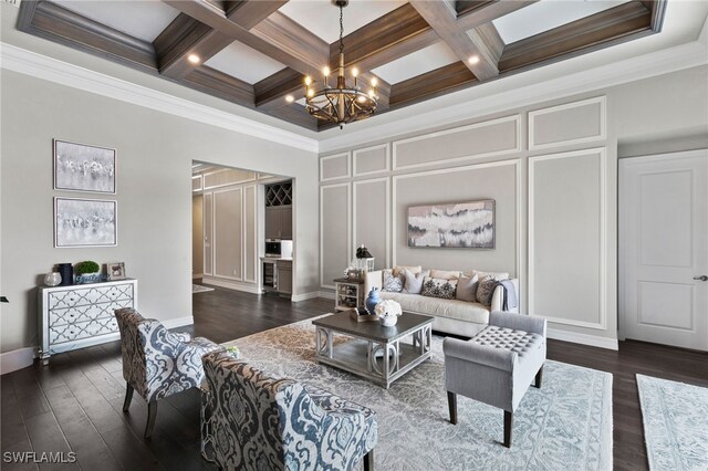 4605 Azalea Dr, Naples, FL 34119 - living room featuring a chandelier, beam ceiling, coffered ceiling, a decorative wall, and dark wood-style flooring