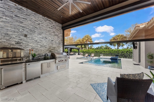 4605 Azalea Dr, Naples, FL 34119 - view of patio with an outdoor kitchen, a ceiling fan, and a pool with connected hot tub