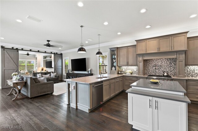 4605 Azalea Dr, Naples, FL 34119 - kitchen featuring a barn door, dishwasher, open floor plan, ornamental molding, and decorative backsplash