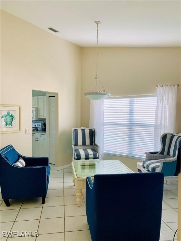 living room featuring light tile patterned flooring