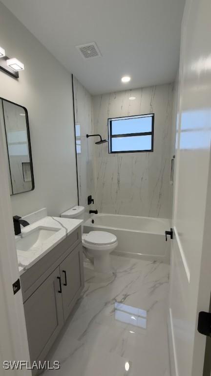 bathroom featuring toilet, bathtub / shower combination, visible vents, marble finish floor, and vanity