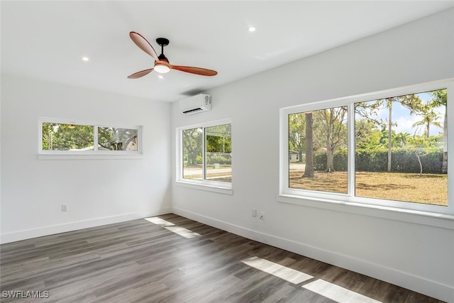 1478 Cordova Ave, Fort Myers, FL 33901 - spare room with a wall mounted AC, ceiling fan, recessed lighting, and wood finished floors